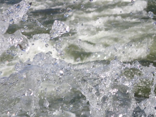 big splash of water in a rapid on the salmon river